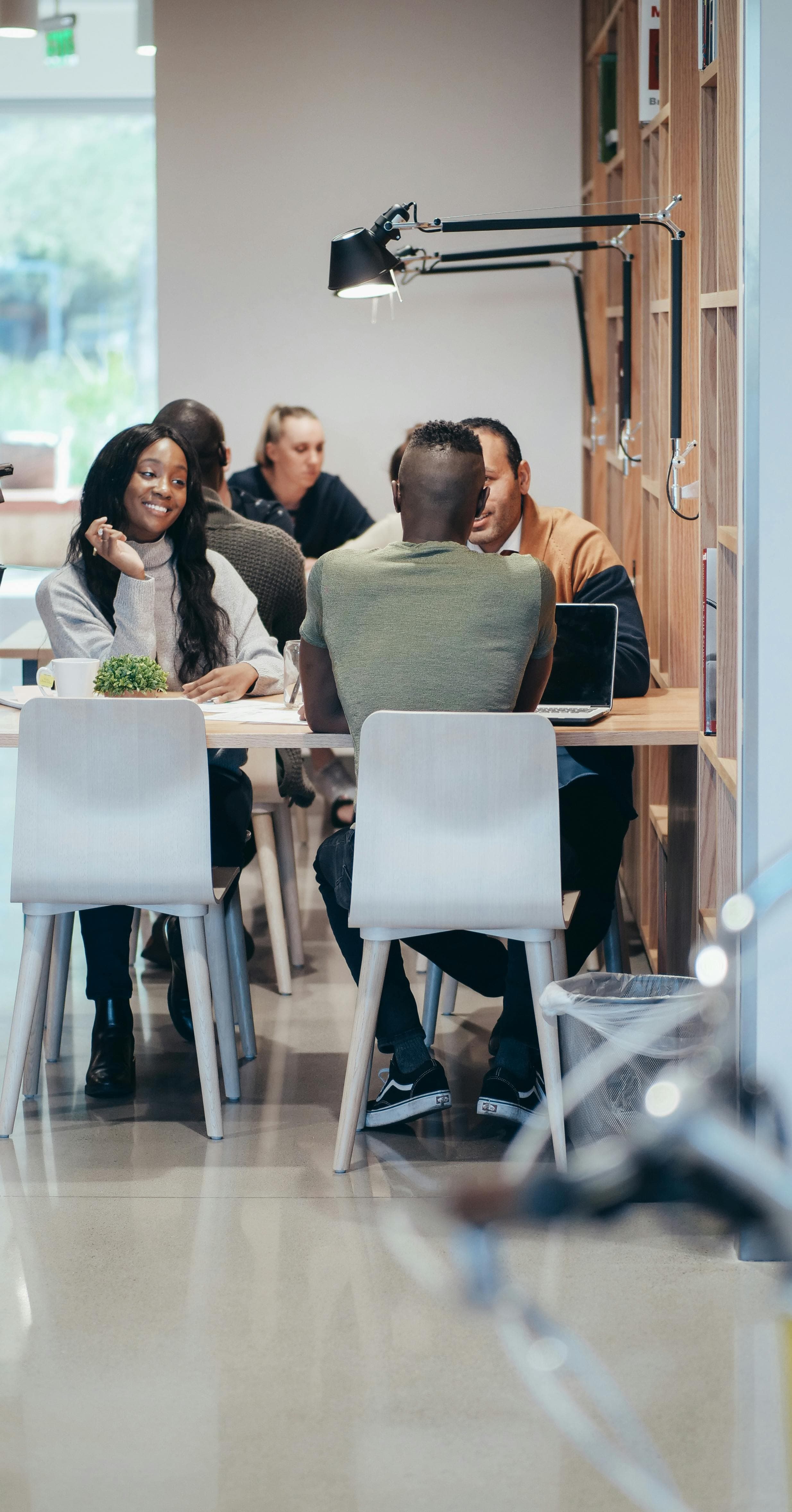 A small business team gathered around a table, working through readiness questions together